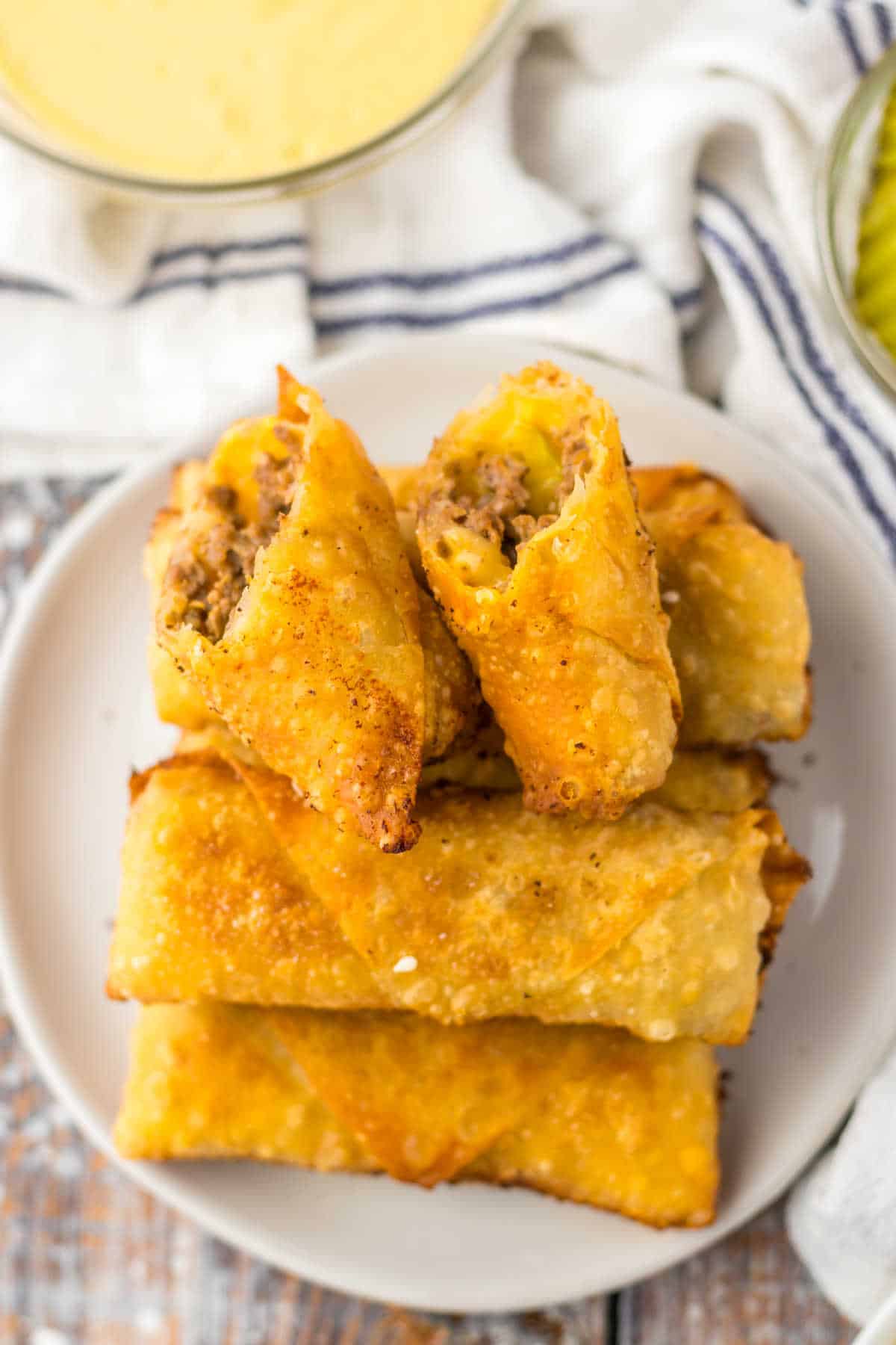 Big Mac egg rolls on a plate.