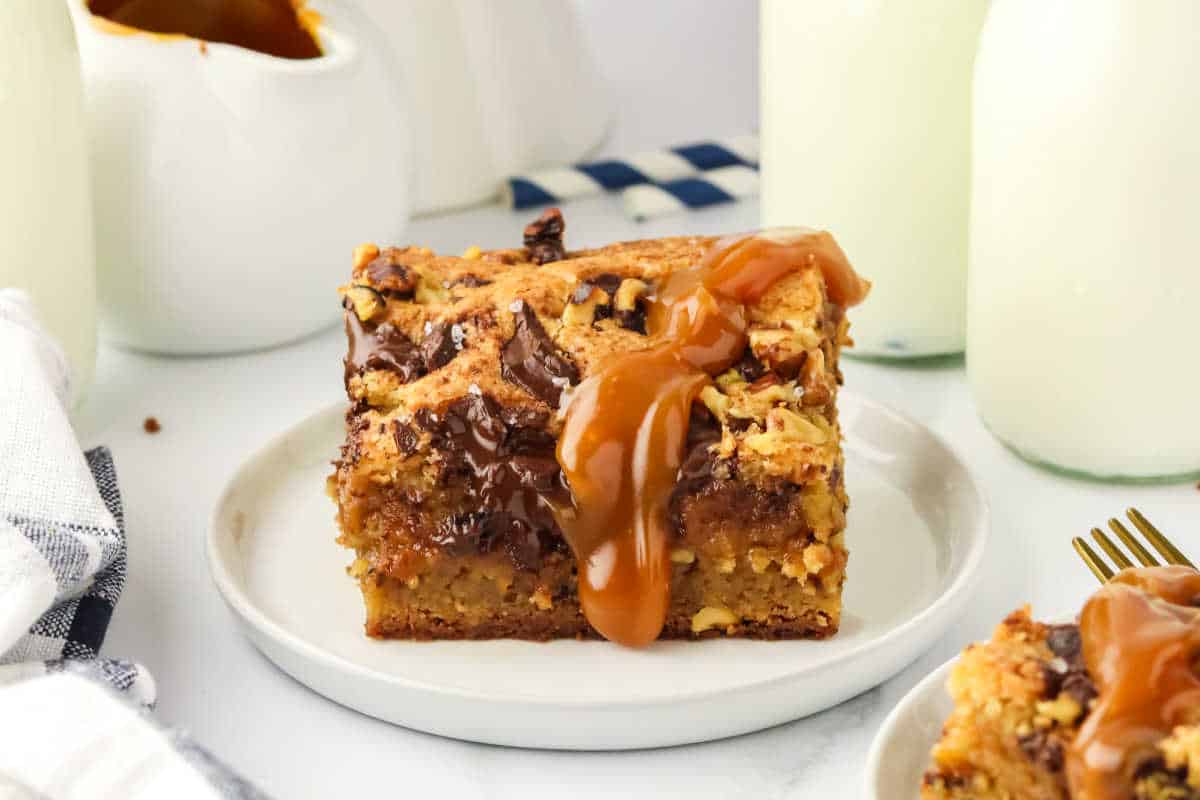 A brown butter caramel blondie on a plate.