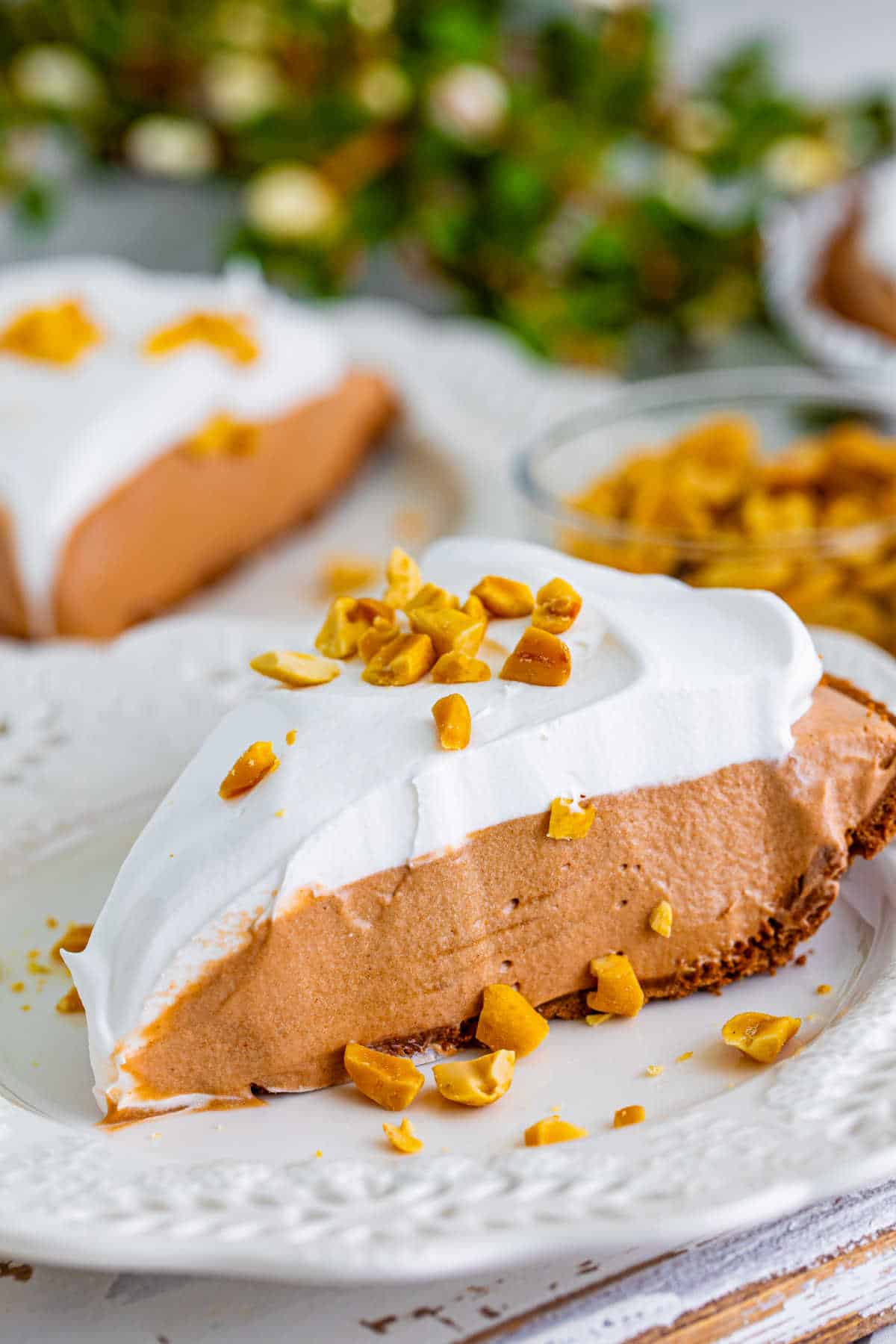 A slice of chocolate peanut butter pie on a plate.