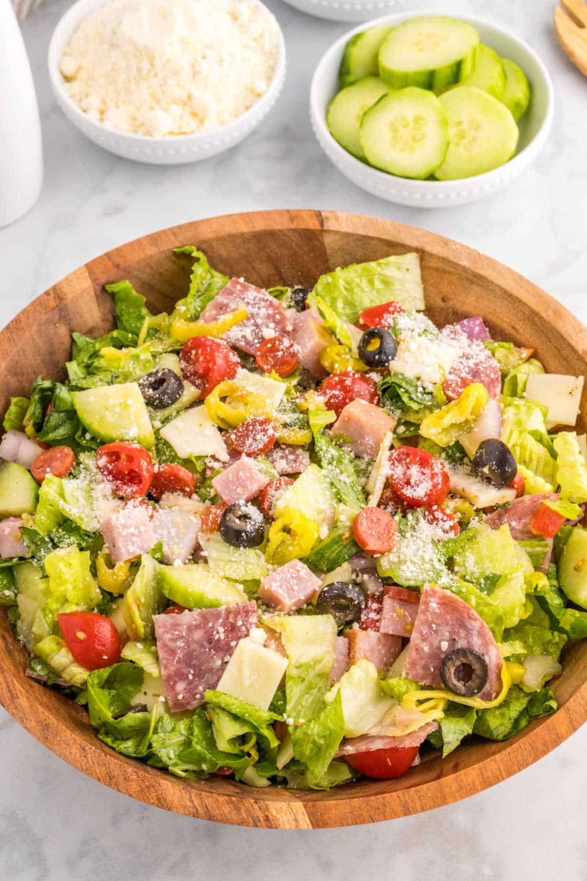 Italian sub salad in a wooden bowl.