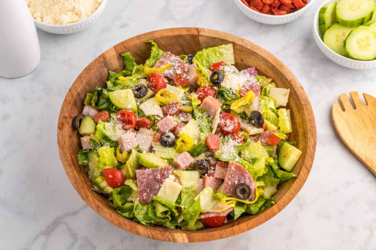 Italian sub salad in a wooden bowl.