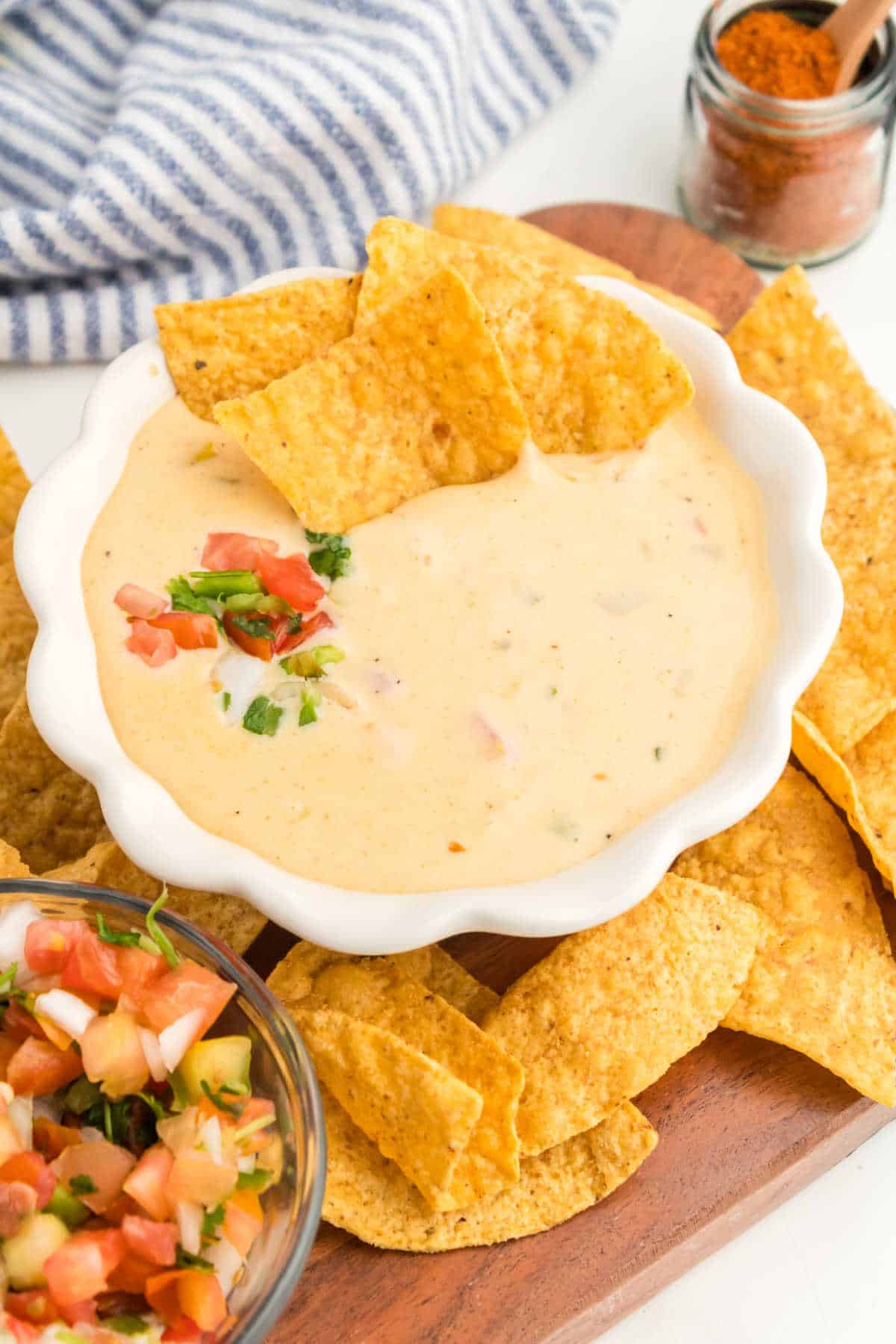 Queso dip with tortilla chips.
