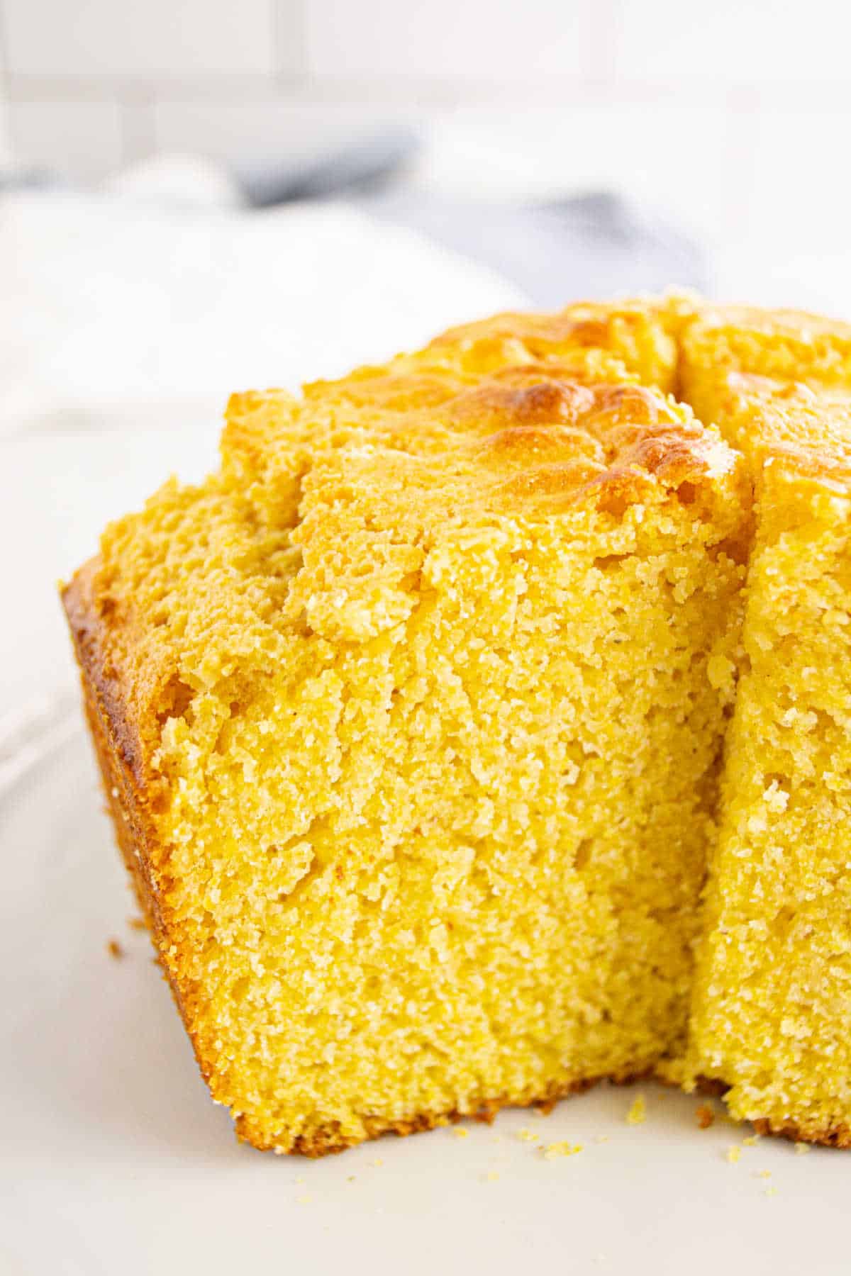 Southern corn cake with a slice cut out.