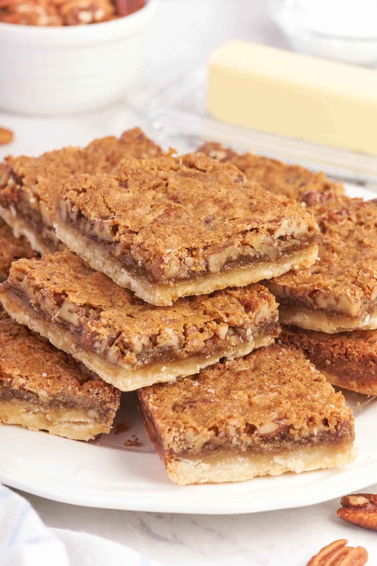 Butter tart squares on a plate.