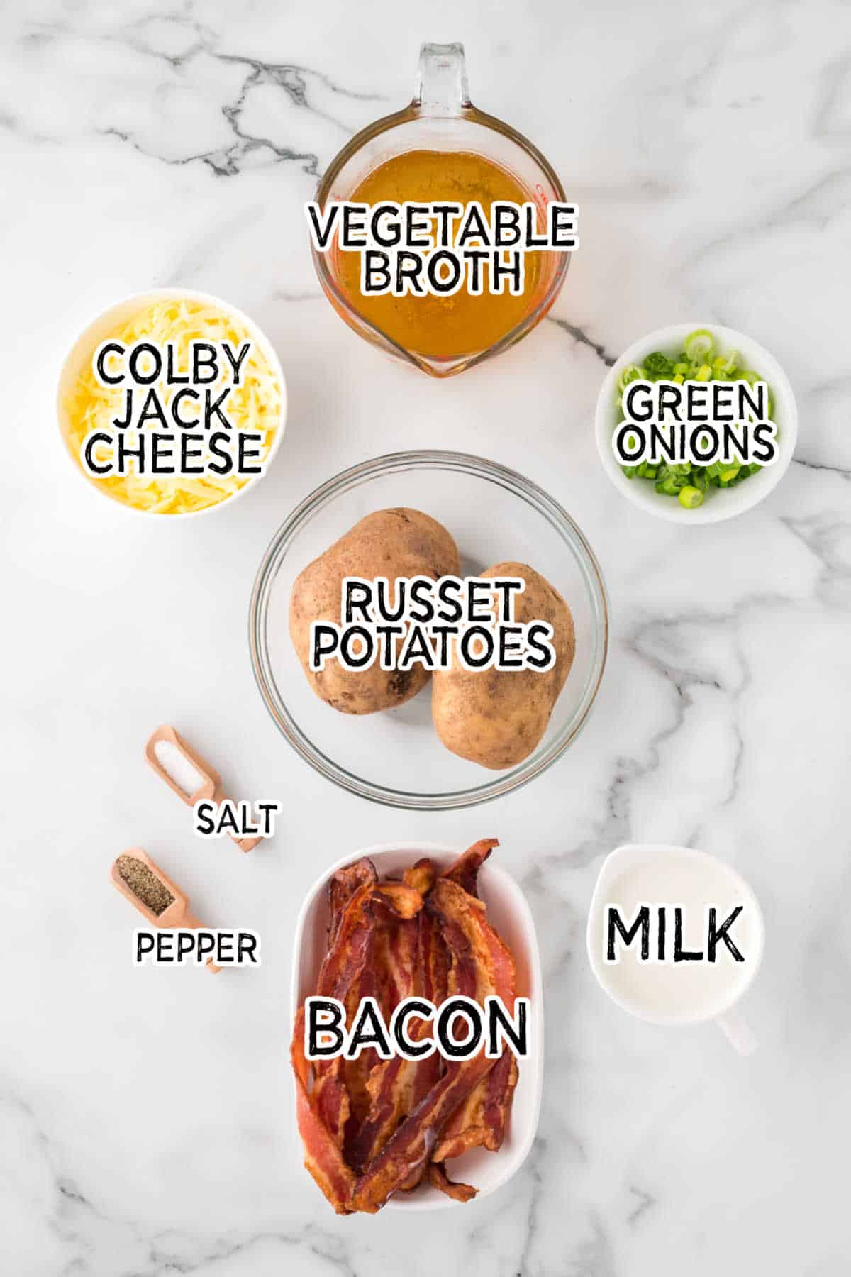 Ingredients on a white marble counter.