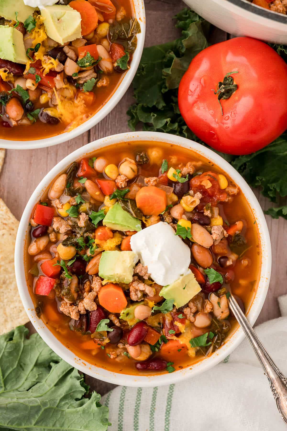 A bowl of southwestern turkey 5 bean chili in a bowl.