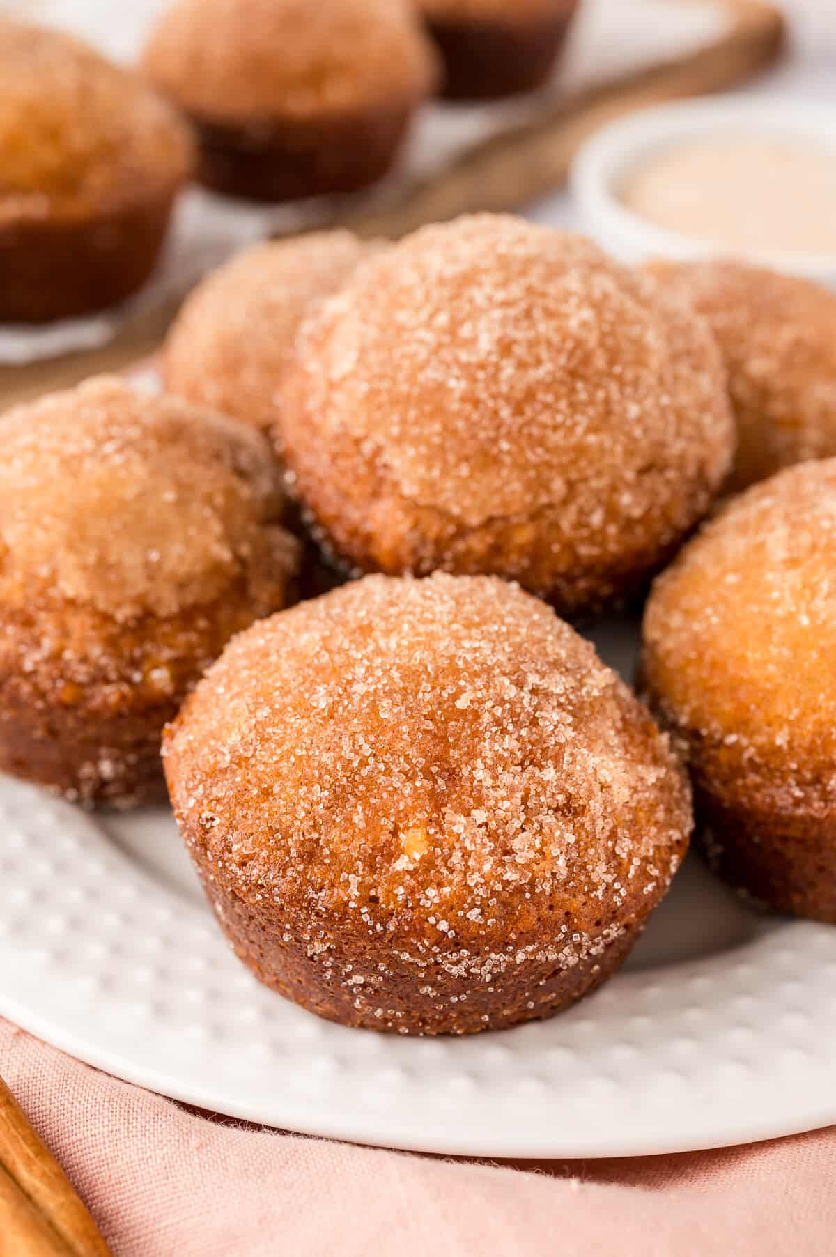 Sugar and spice muffins on a plate.