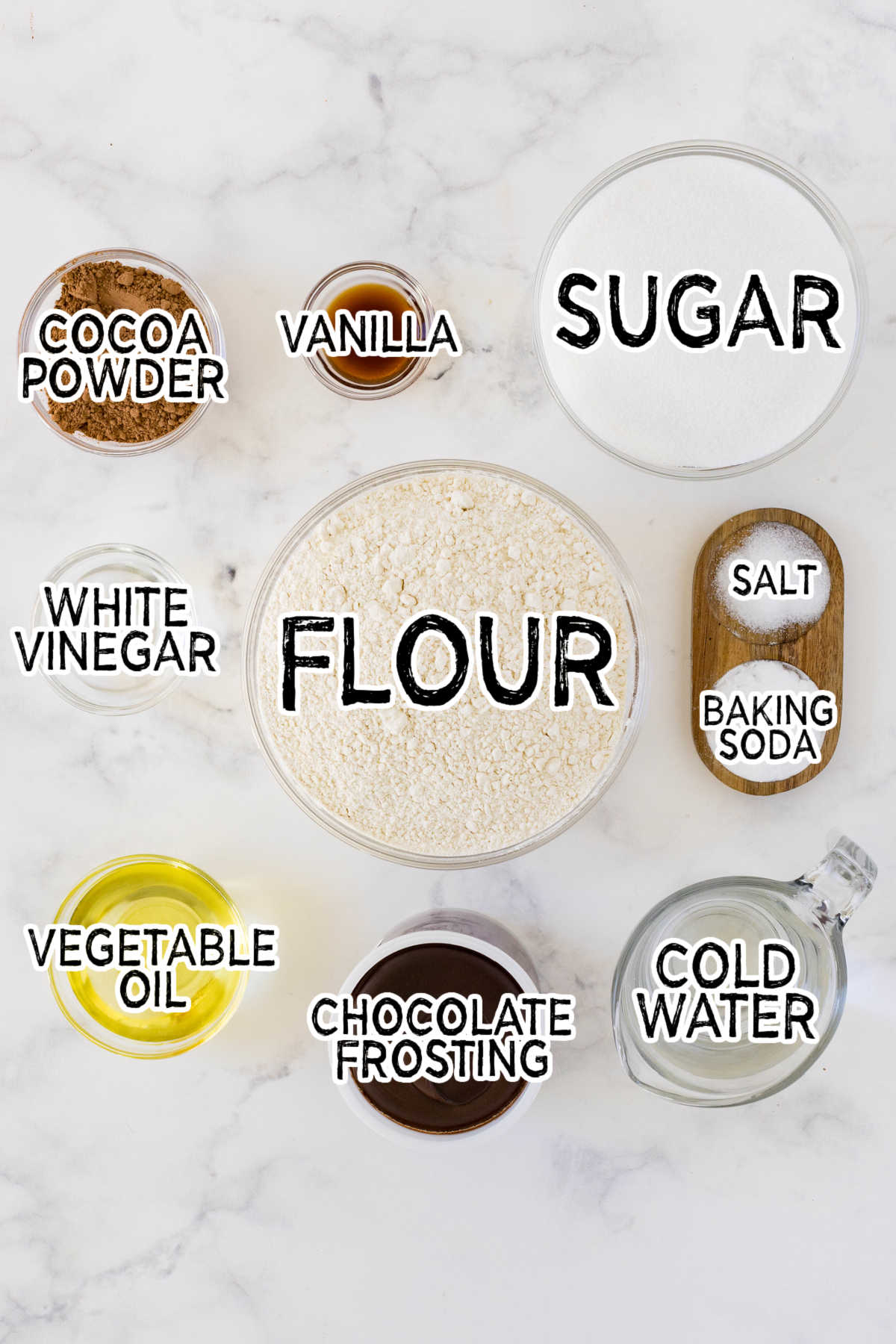 Ingredients required to make the recipe prepared on a white counter top. 