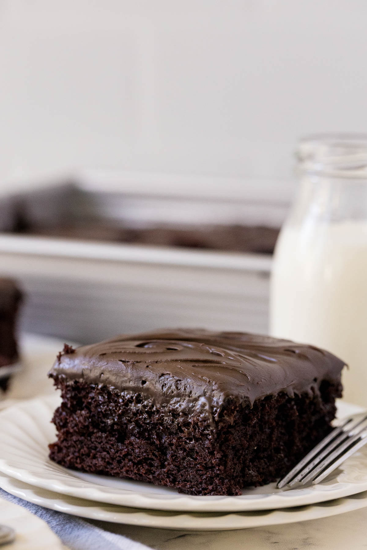 A piece of wacky cake on a plate.