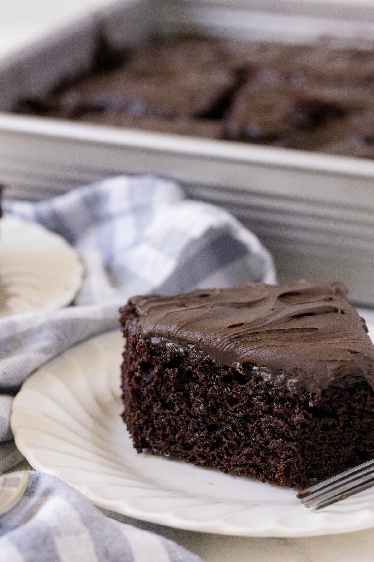 A piece of wacky cake on a plate.