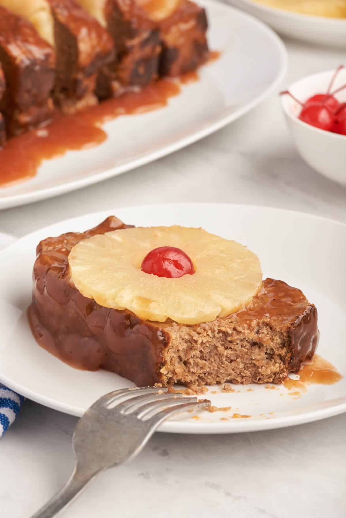 A slice of Caribbean meatloaf on a plate.