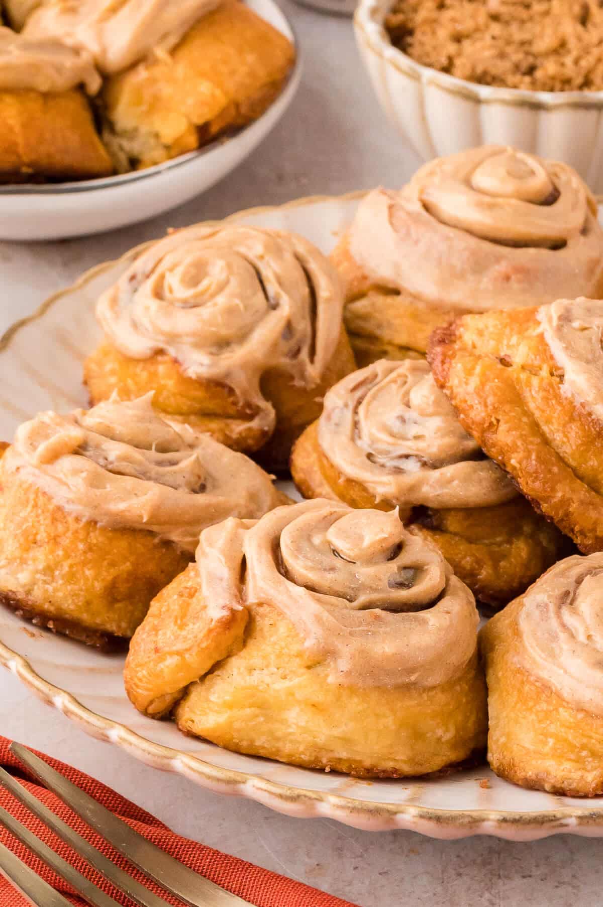 Gingerbread cinnamon rolls on a plate.