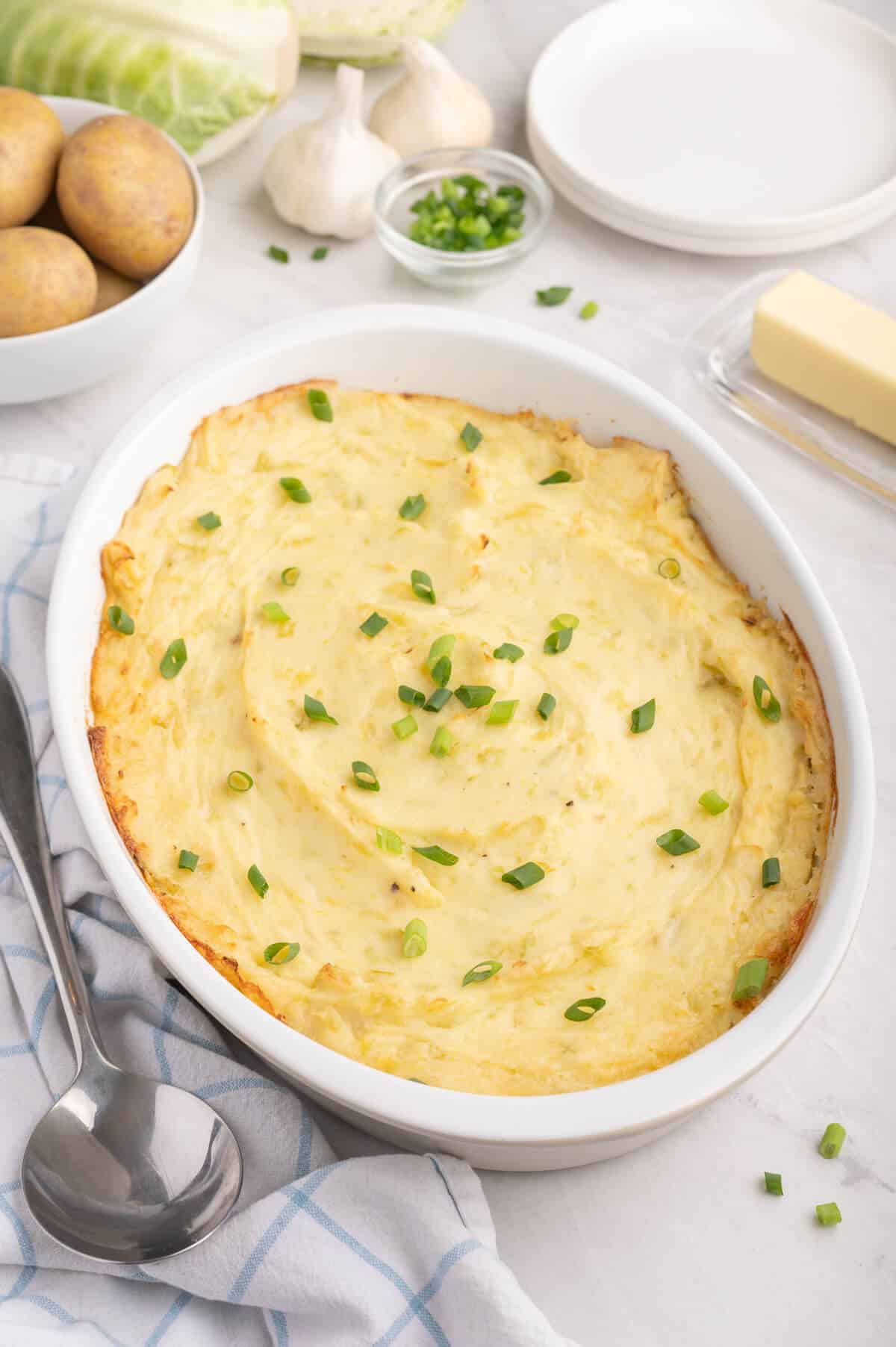 Irish potatoes in a white casserole dish.