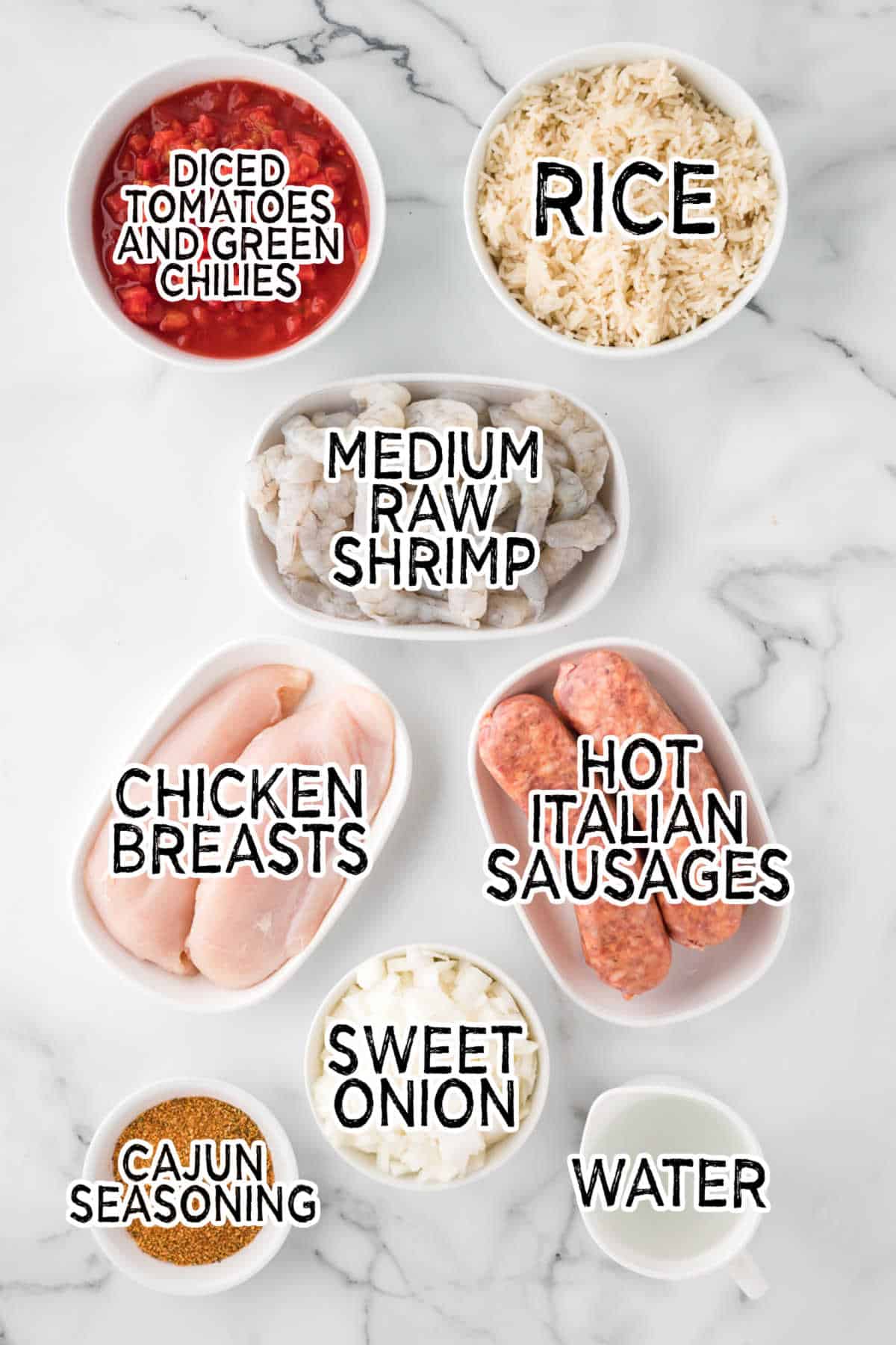 Ingredients on a white marble counter.
