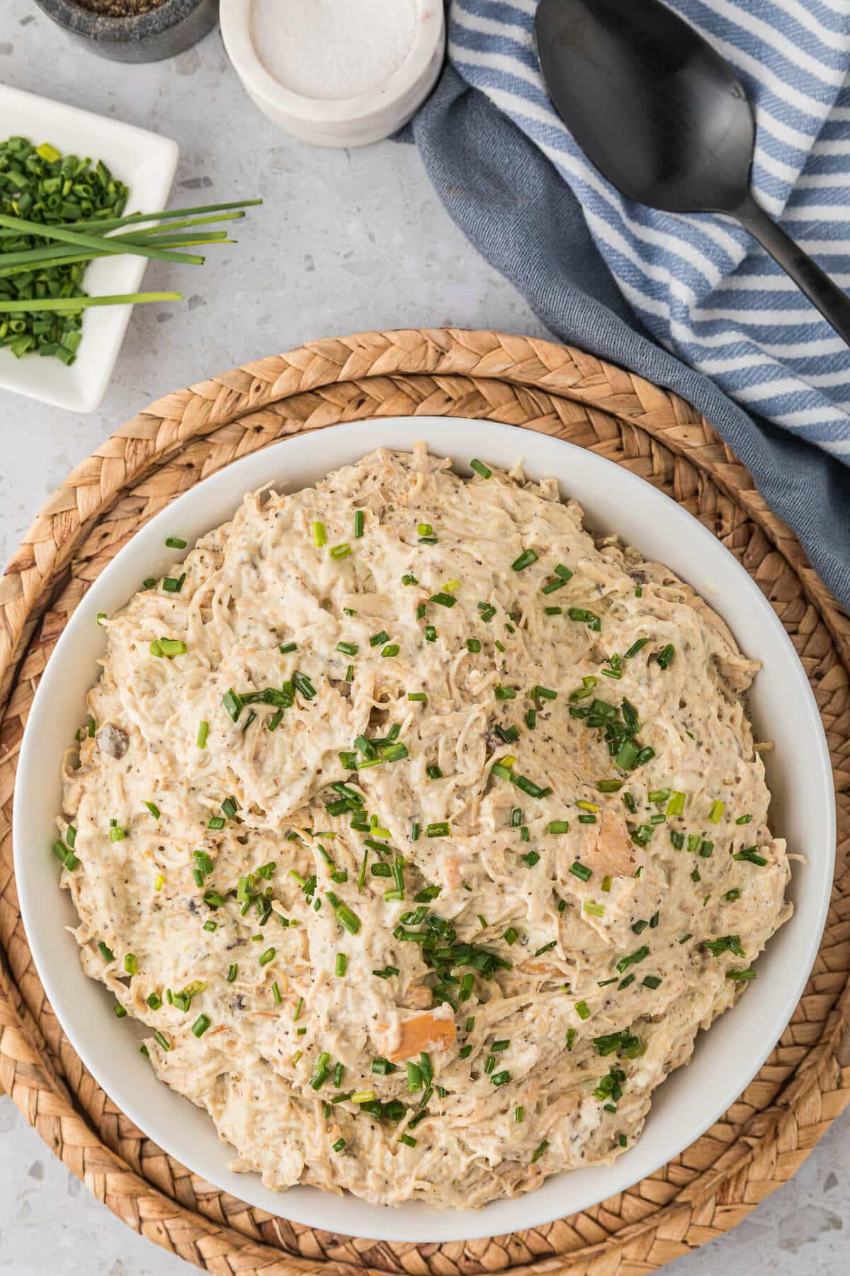 Slow cooker cream cheese chicken in a bowl.