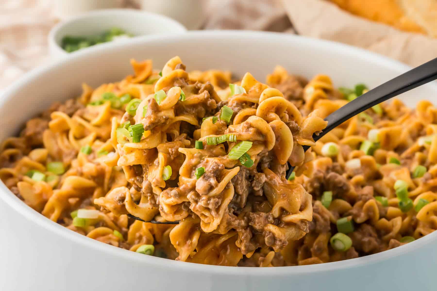 5 Soup Pasta in a bowl with a serving spoon.