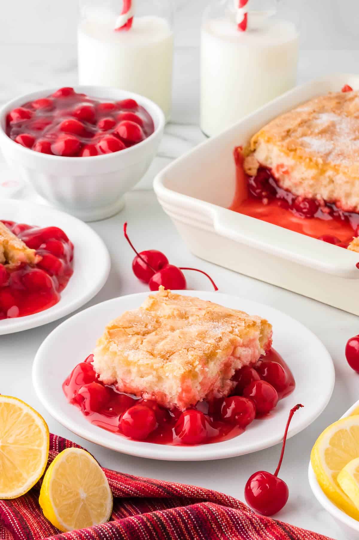 A piece of Cherry Pudding Cake on a plate.