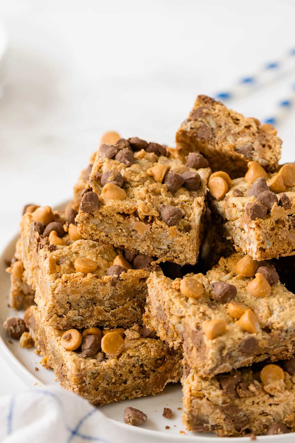 Chewy Bars stacked on a plate.