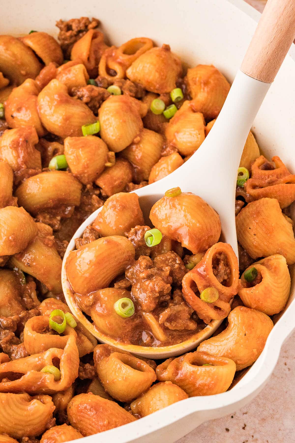 A pot of grandma's goulash with a ladle.