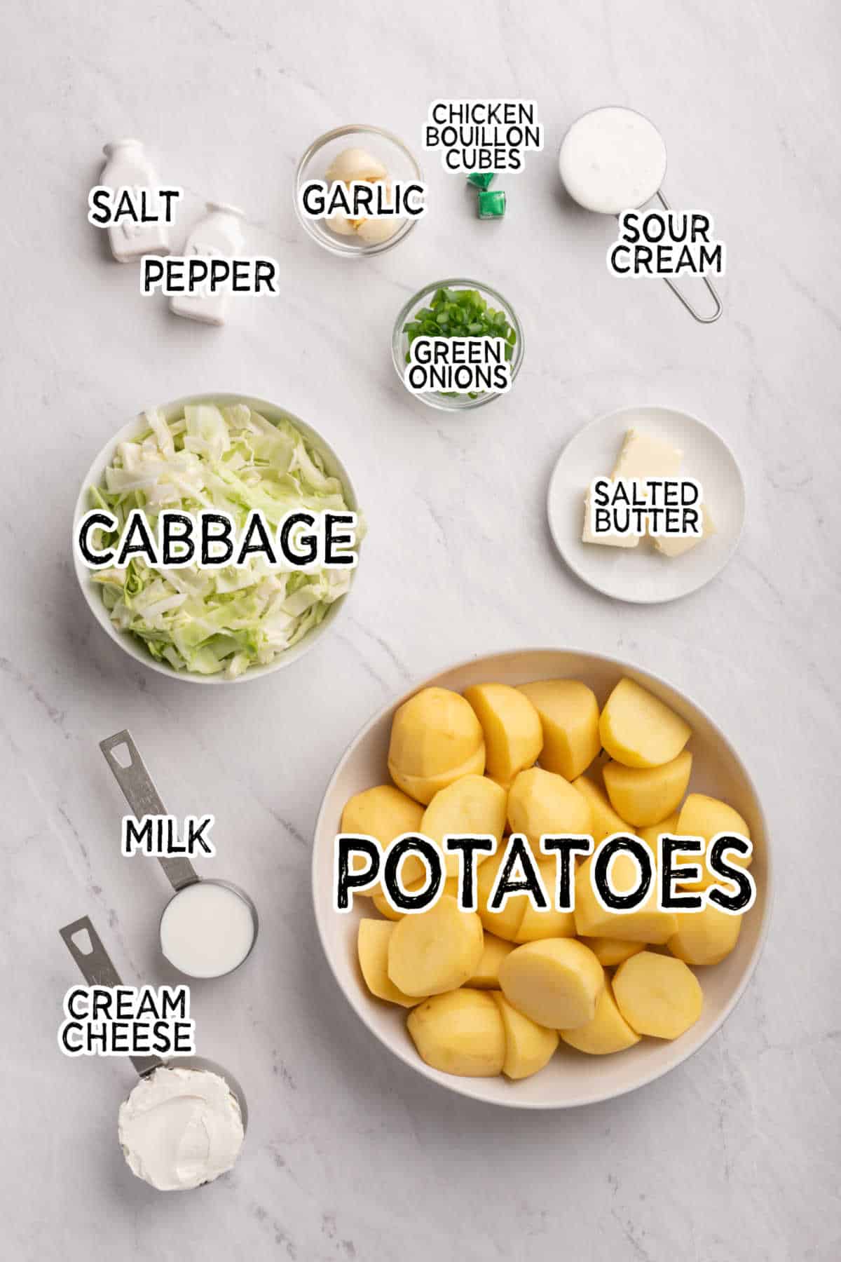 Ingredients on white marble counter.