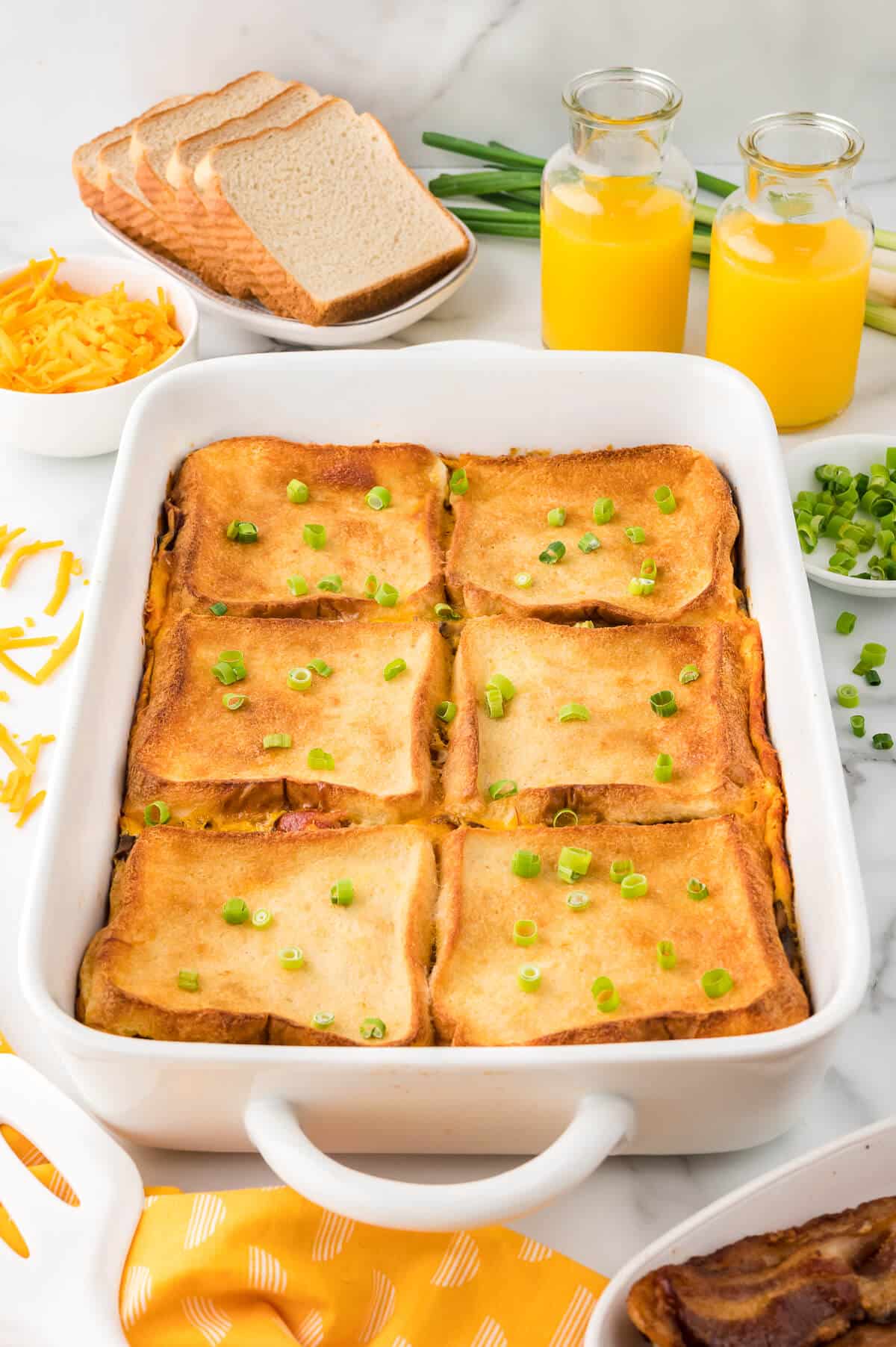 Overnight bacon breakfast casserole in a pan.