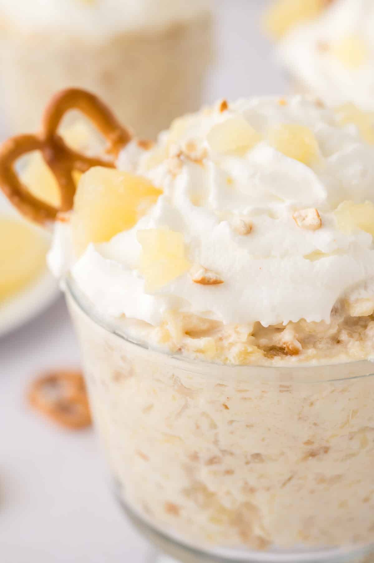 Pineapple Pretzel Fluff in a parfait dish.