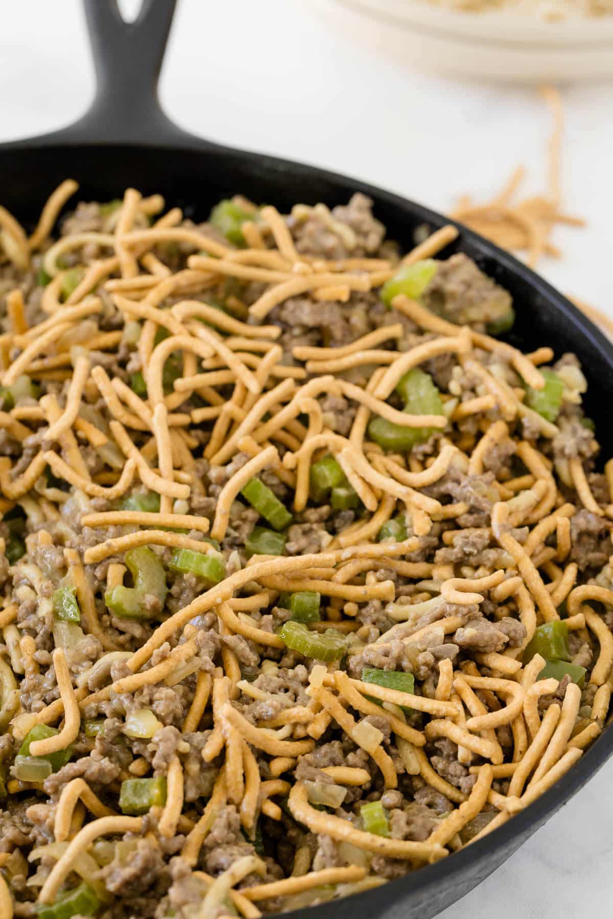 Chow mein skillet in a cast iron pan.