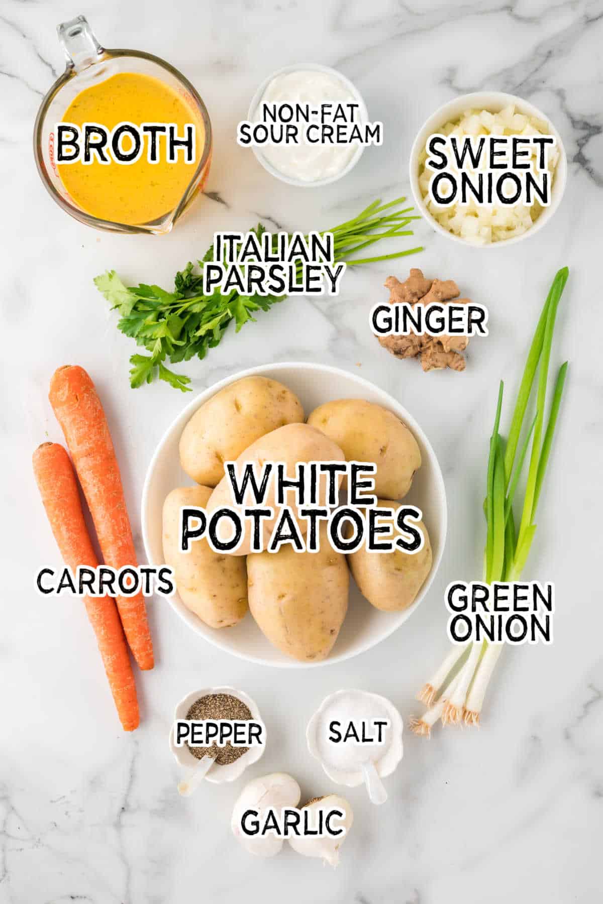 Ingredients to make carrot and potato soup.