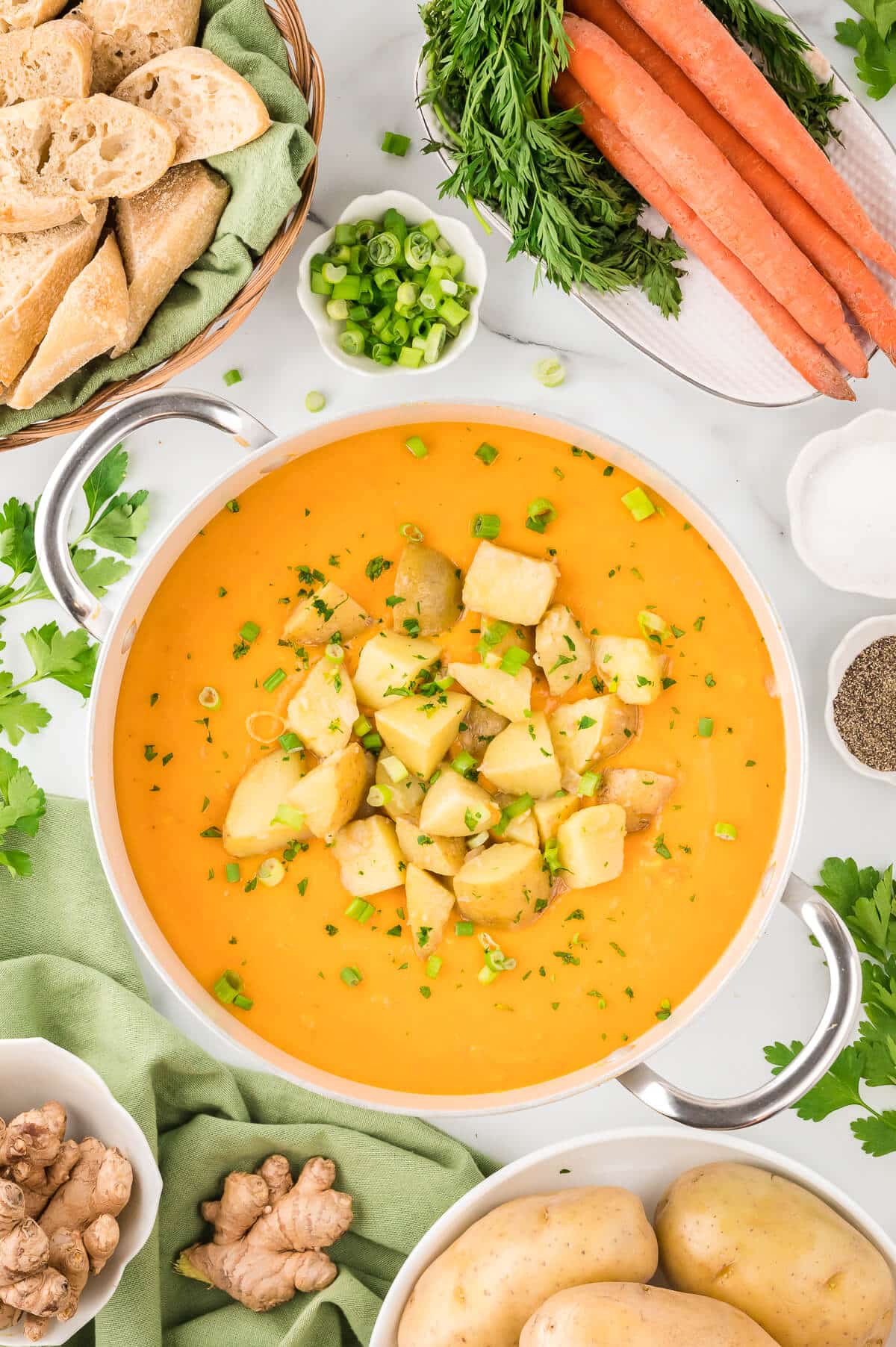 A pot of carrot and potato soup.