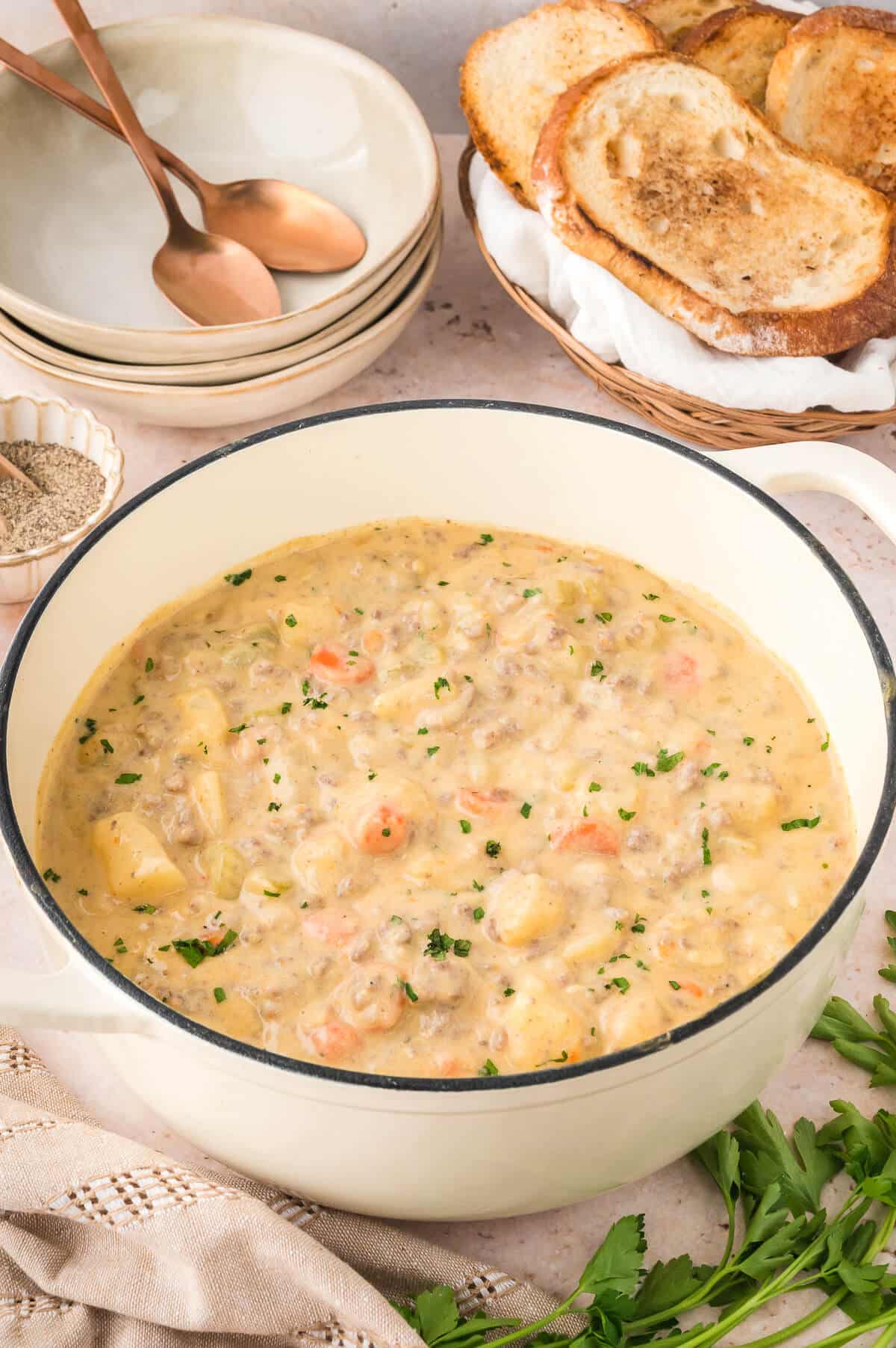 A pot of cheeseburger chowder.