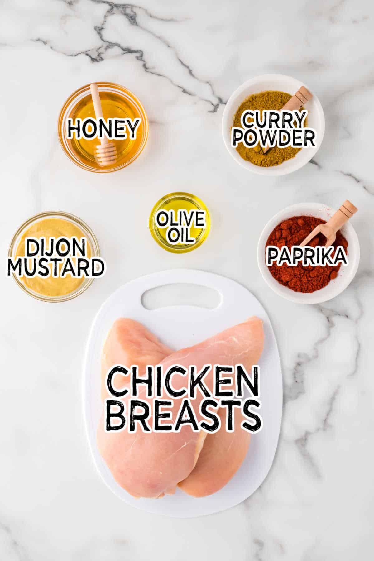 Ingredients on a white marble counter.