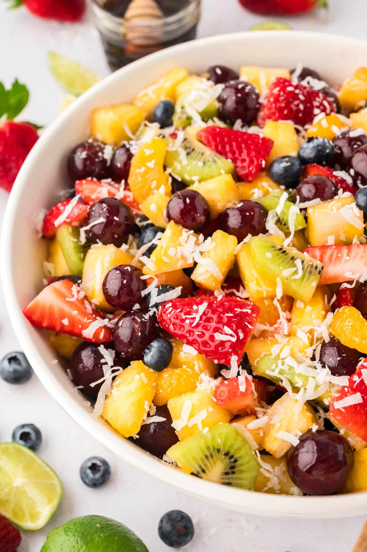 A bowl of rainbow fruit salad.