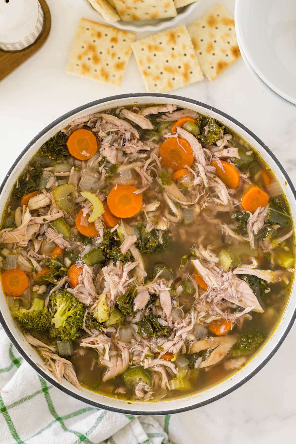 A pot of very veggie chicken and rice soup.