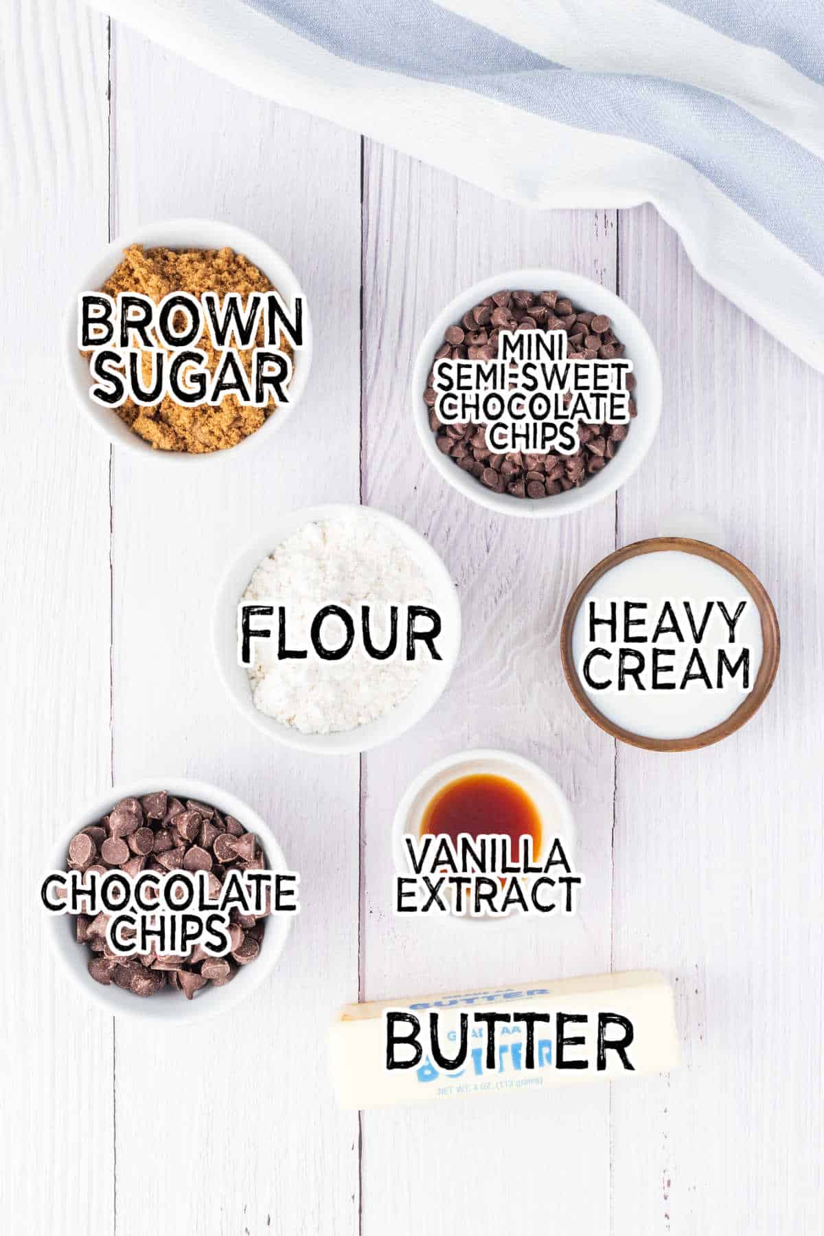 Ingredients on a white wood surface.