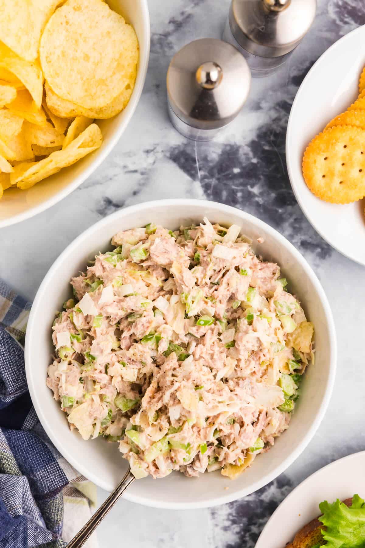 Tuna salad in a white bowl.