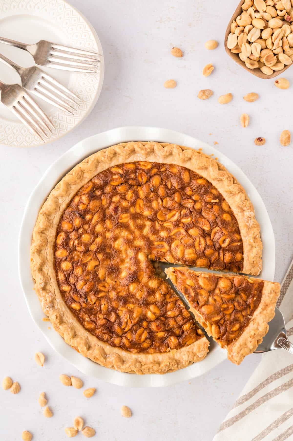 Peanut Pie with a slice cut out.