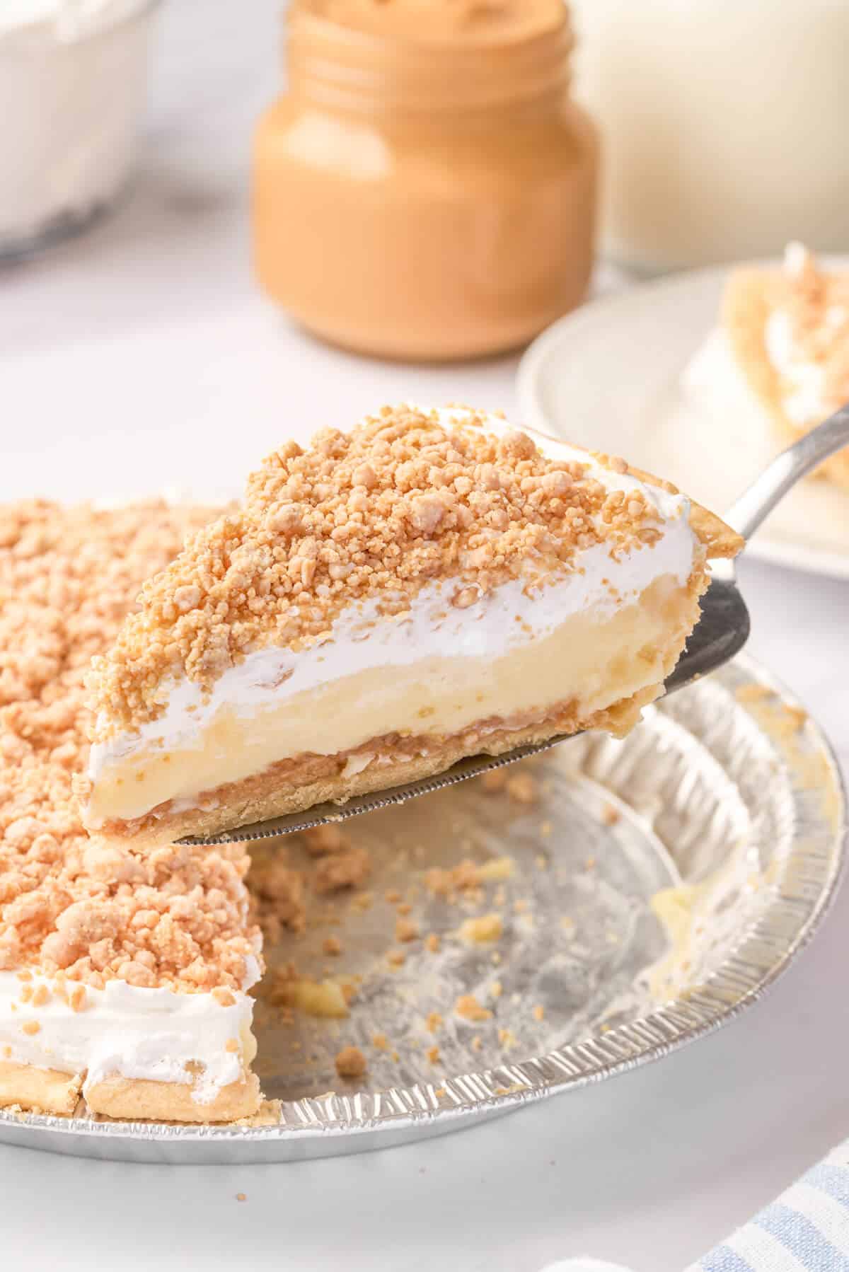 A slice of pie on a spatula.