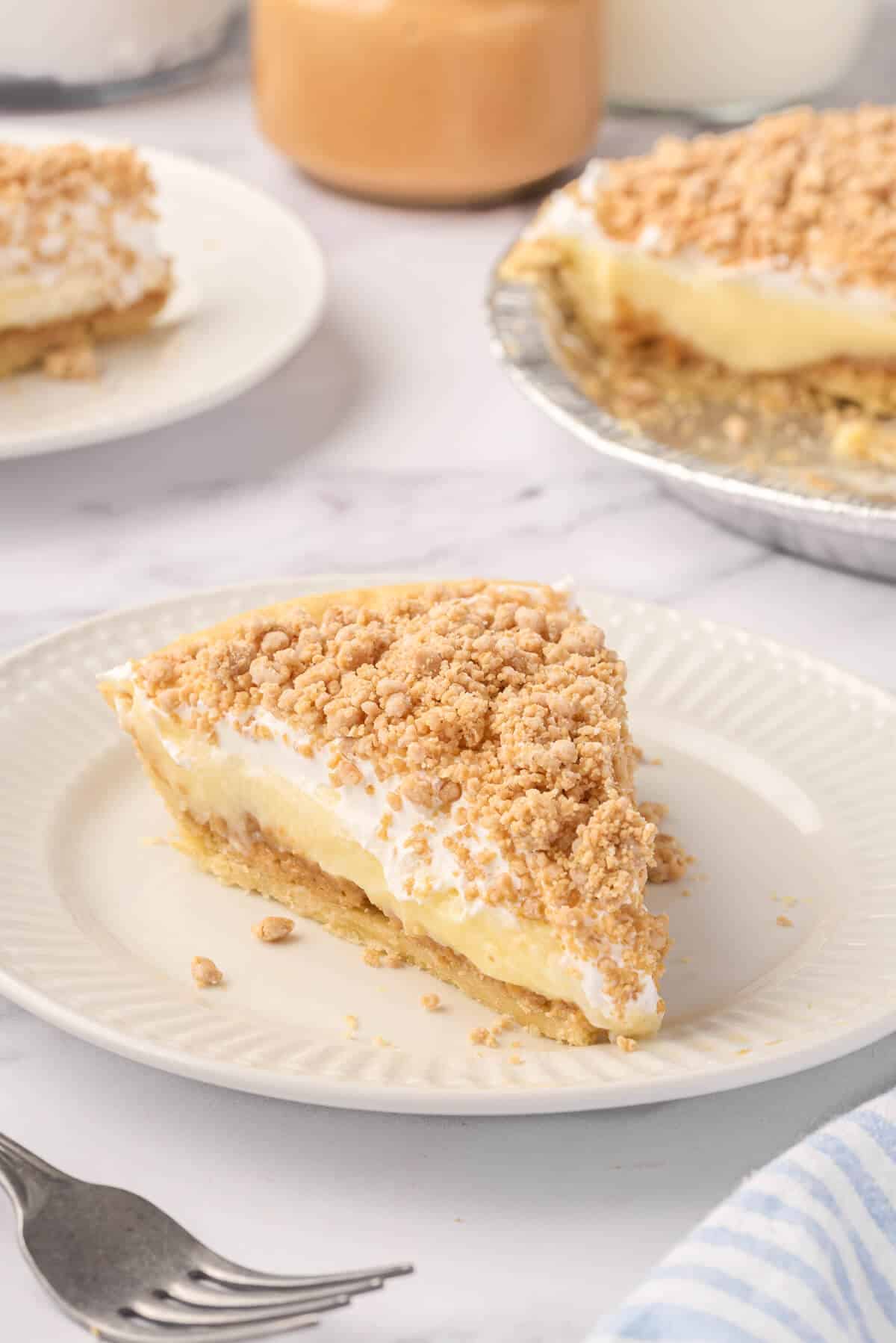 A slice of pie on a plate.