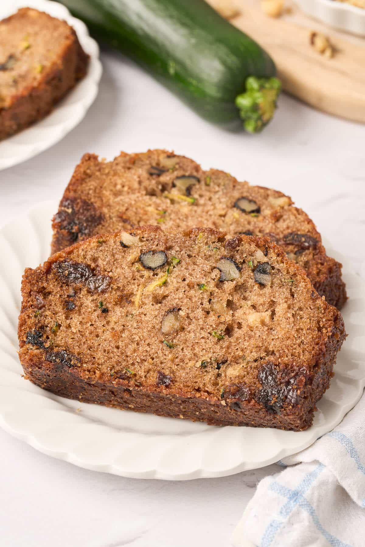 Slices of zucchini bread on a plate.