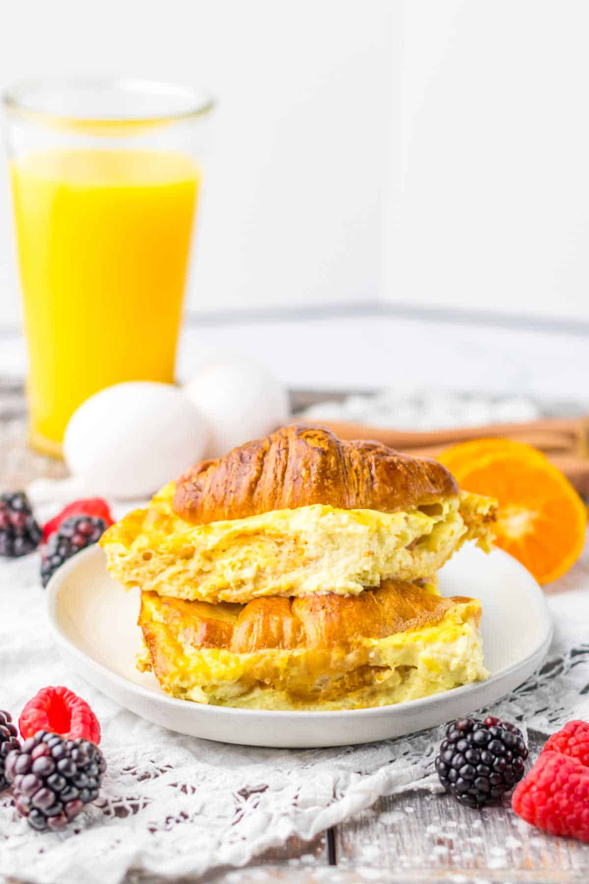 Ham and Swiss croissant bake on a plate.