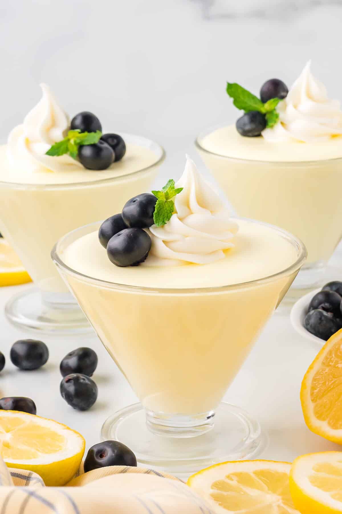 Lemon cheesecake mousse in a parfait dish.