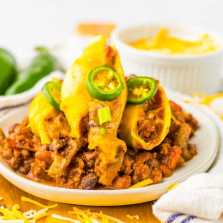 Chili cheese stuffed shells on a plate.