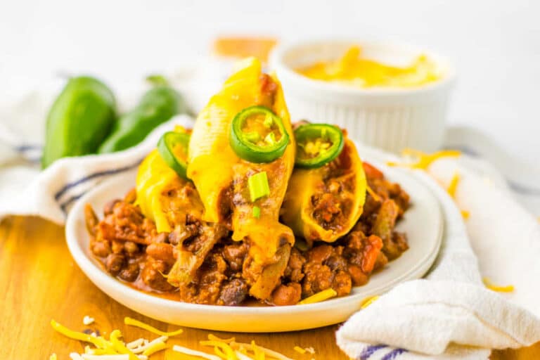 Chili cheese stuffed shells on a plate.