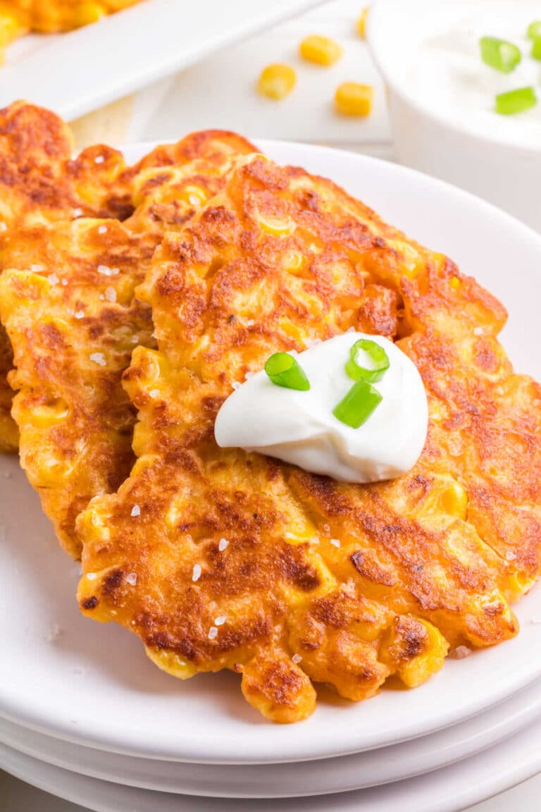 Corn fritters on a plate.