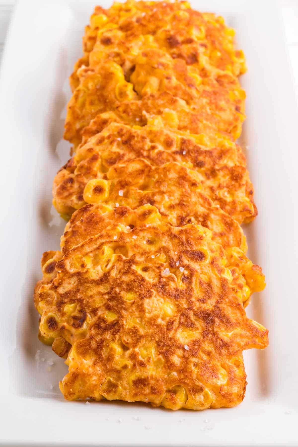 Corn fritters on a platter.