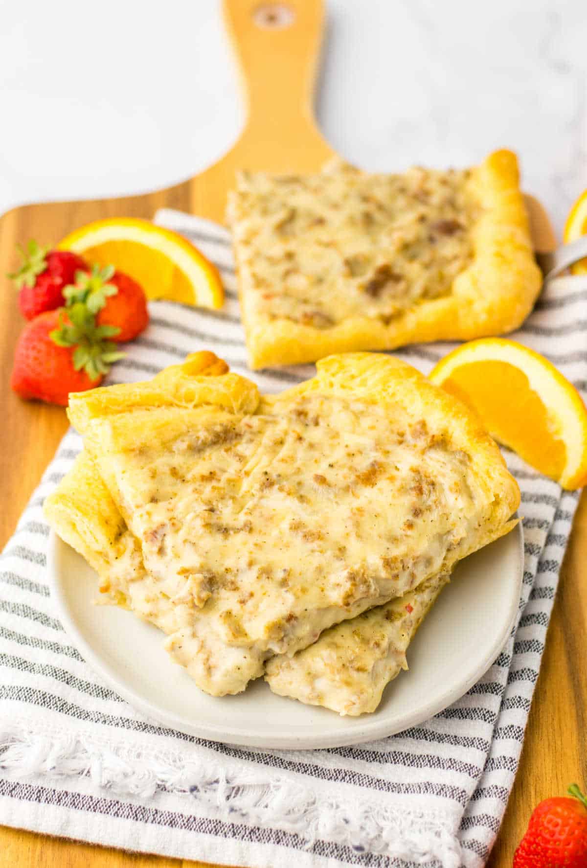 Slices of school breakfast pizza on a plate.