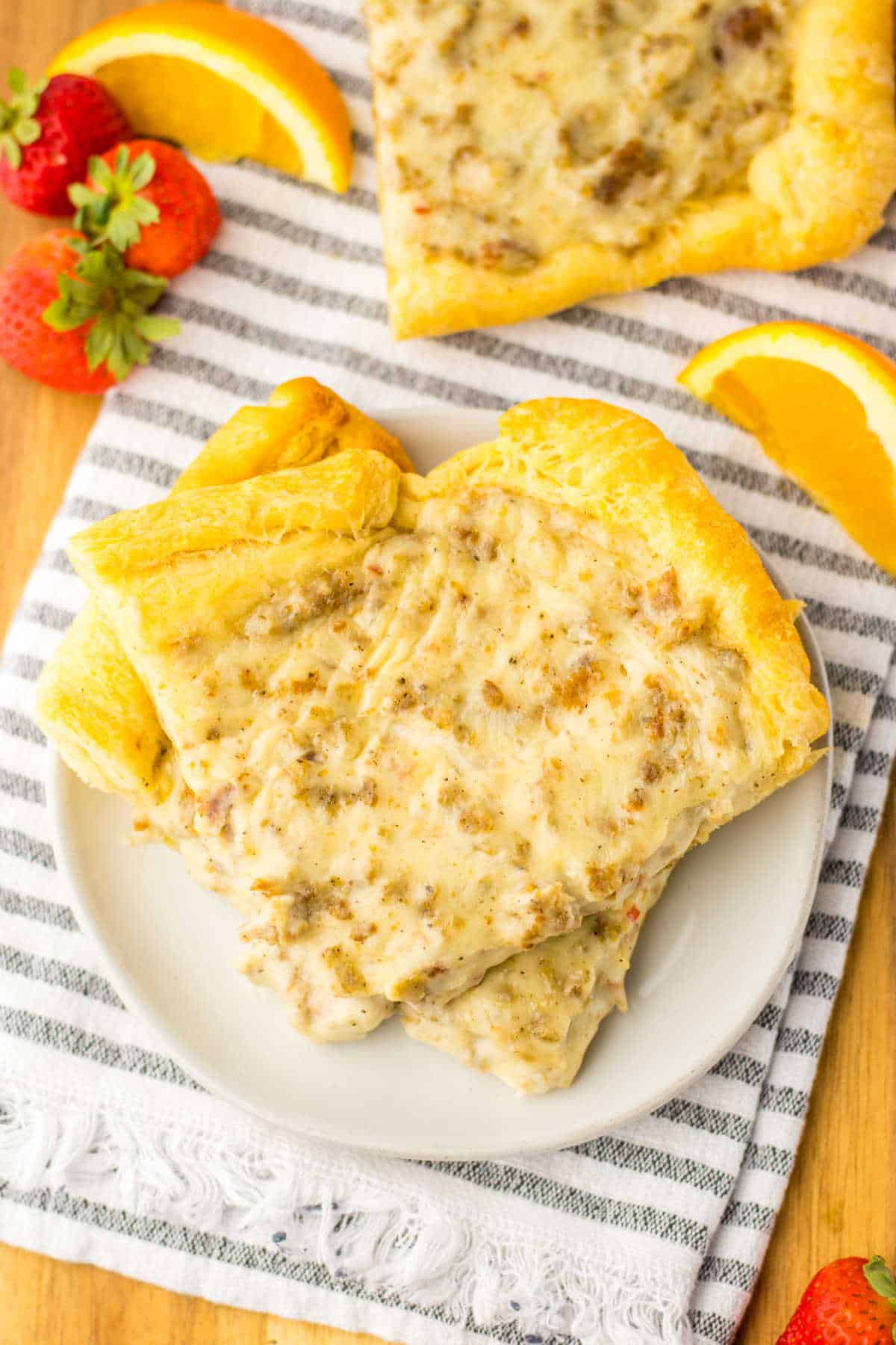 Slices of school breakfast pizza on a plate.