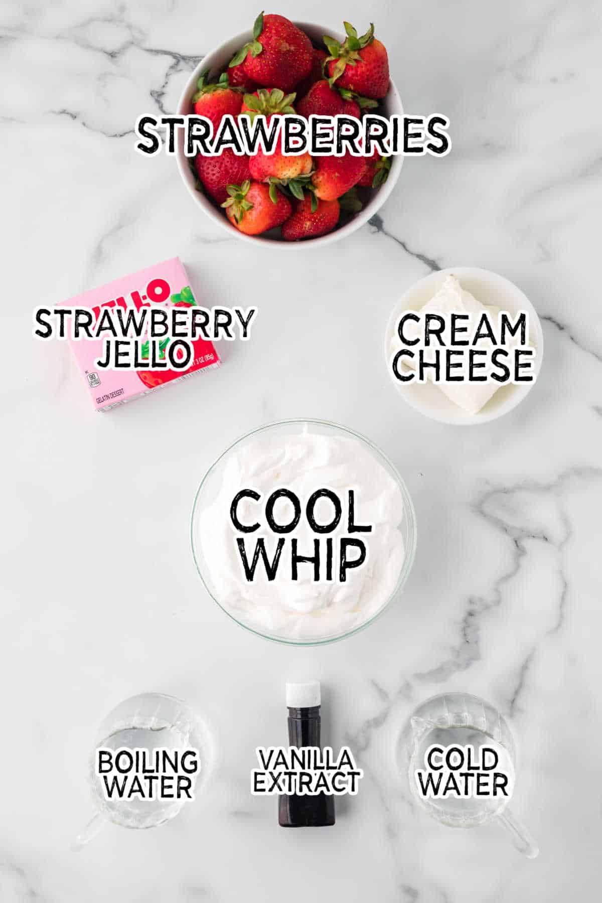 Ingredients on a white marble counter.