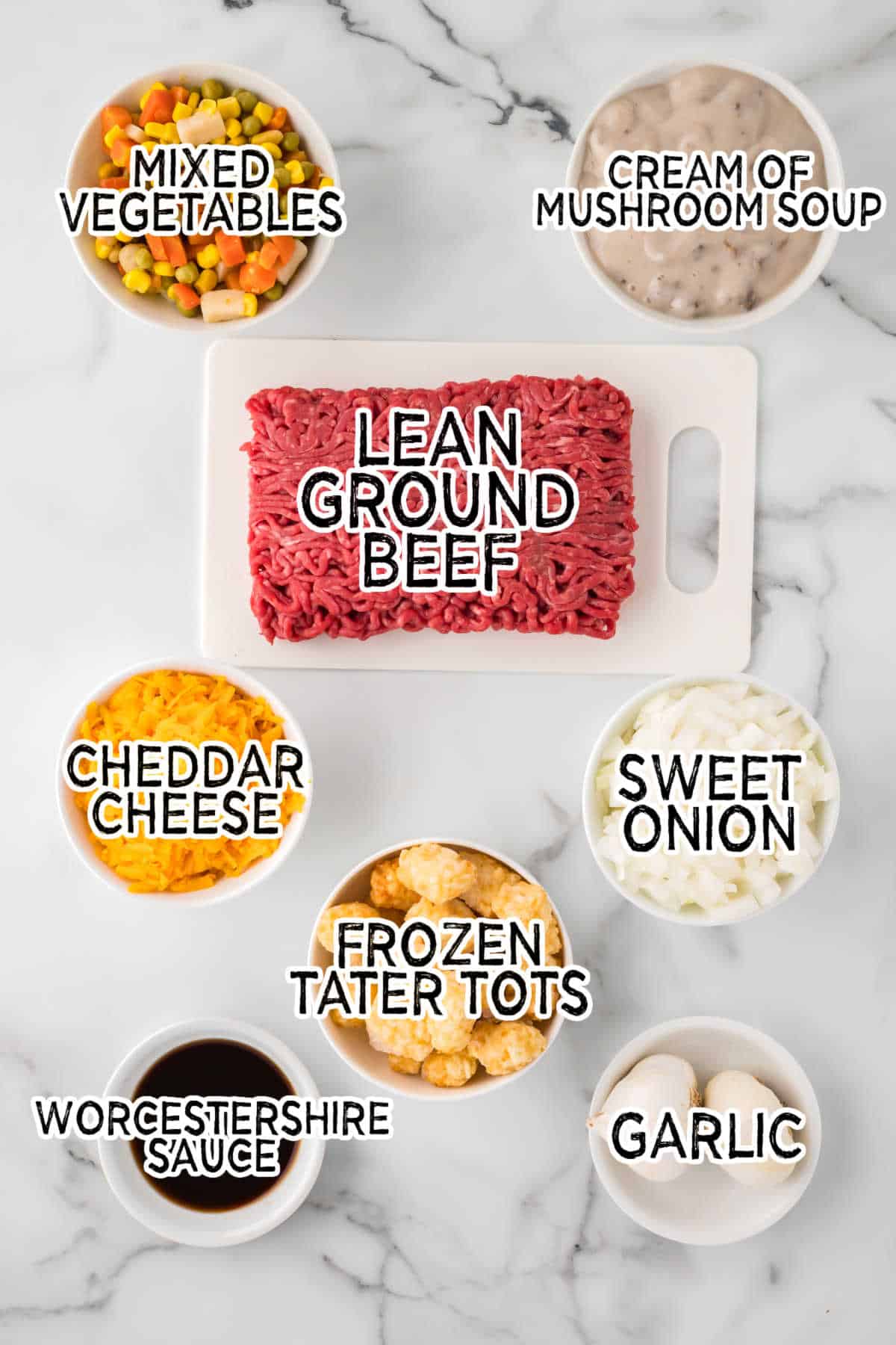 Ingredients on a white marble counter.