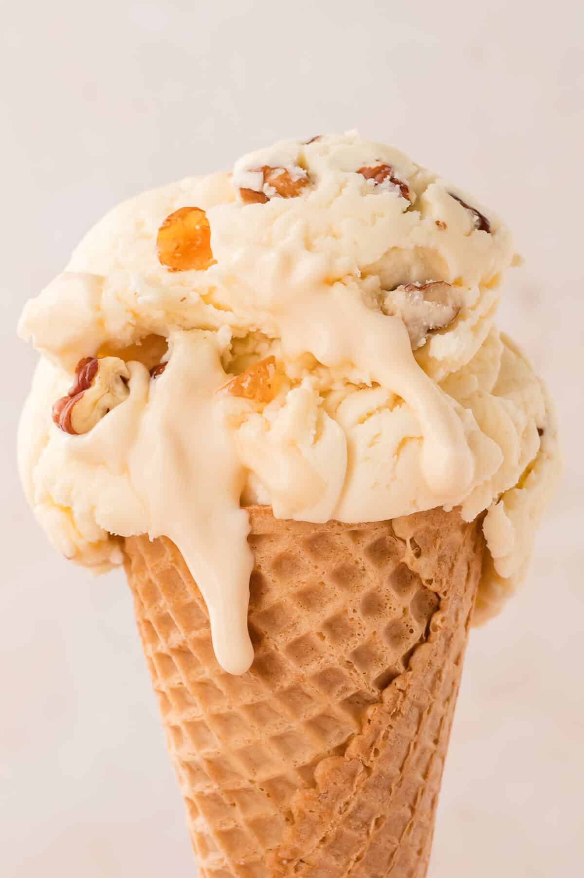 Maple pecan ice cream in an ice cream cone.